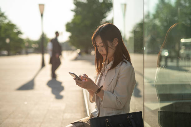 istock Businesswoman watching smart phone 1151706446