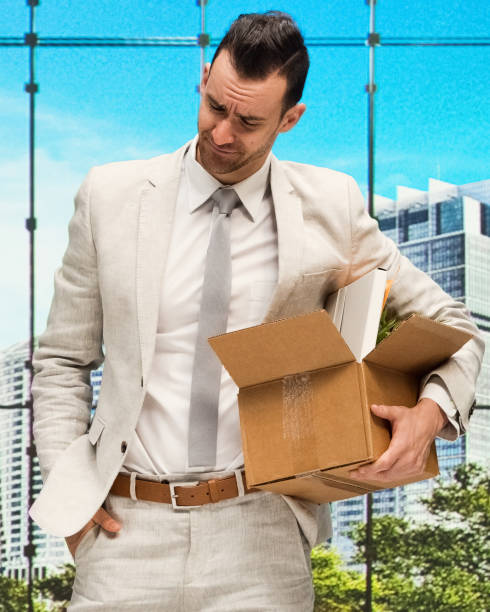 istock Handsome businessman standing at work who is now unemployed 1151706483