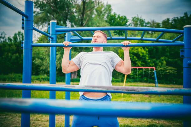 istock Young man doing gymnastic on the bar 1151707380