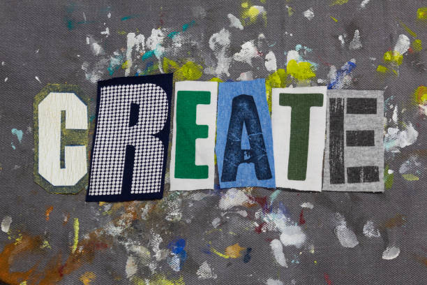 istock CREATE text word collage colorful fabric on painted gray denim, creative freedom 1151709109