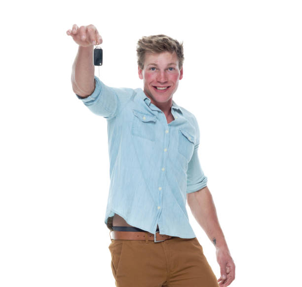 istock Man holding car keys 1151711798
