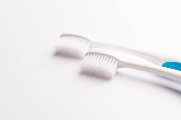 istock White toothbrush isolated on white background 1151717328