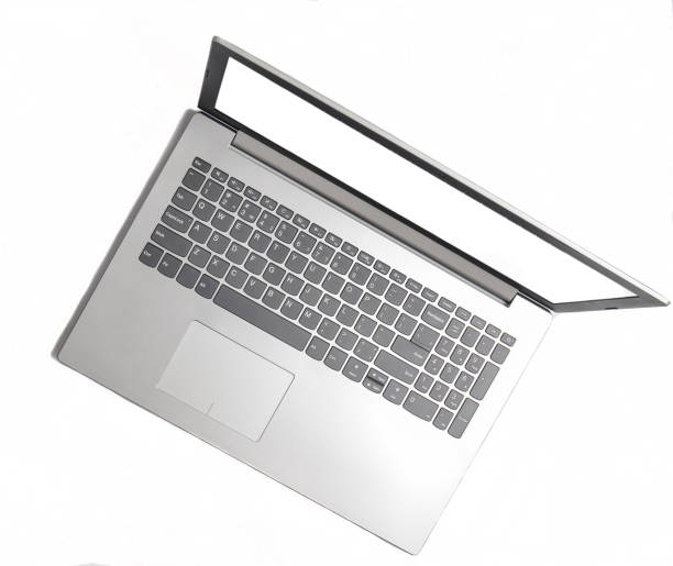 Laptop and frameless phone on a white background. Modern technological gadgets, white screens for copy space