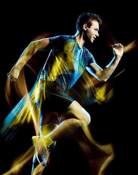 istock runner running jogger jogging man isolated light painting black background 1151732035