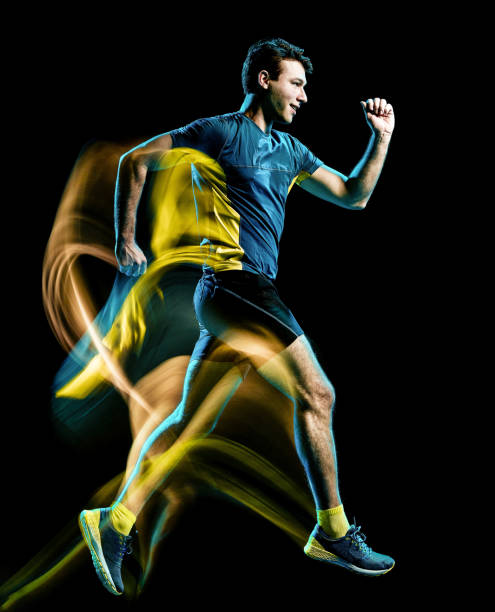 istock runner running jogger jogging man isolated light painting black background 1151732043