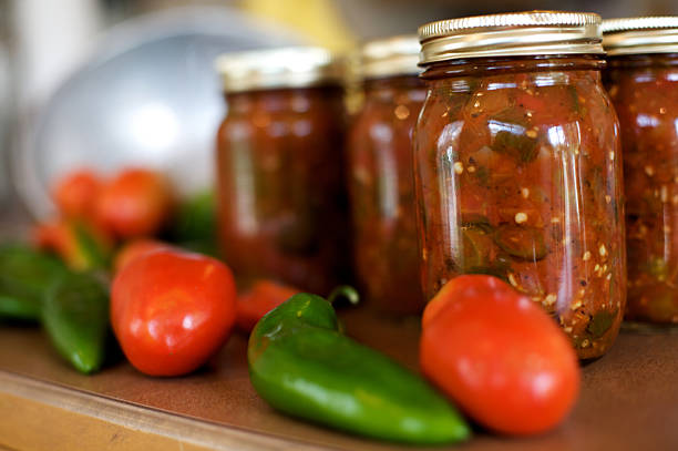canned salsa from fresh tomato, pepper, cilantro,garlic,onion vegetables red and green Anaheim chili peppers