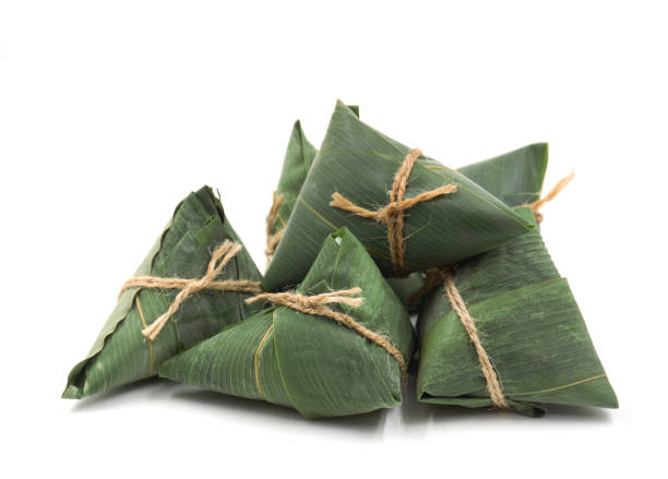 istock traditional wrapped rice dumplings  isolated on white background. 1151735289