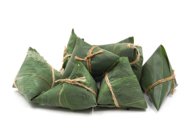 istock traditional wrapped rice dumplings  isolated on white background. 1151735322