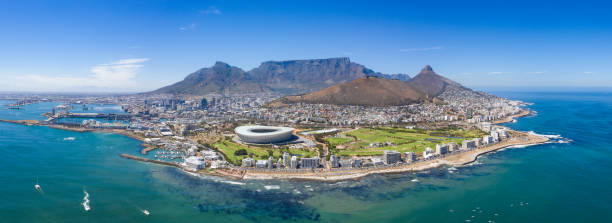 Aerial view of Capetown and Table Mountain Fantastic aerial shot of the Cape Town Coast line, including, Table Mountain, the stadium, Lions head and the waterfront signal hill stock pictures, royalty-free photos & images