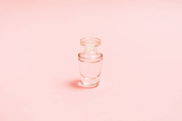 istock Cosmetic aroma liquid in transperent perfume bottle 1151745681
