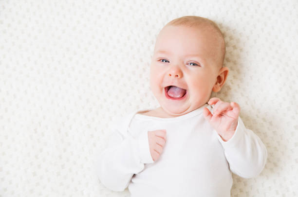 Baby on White, Happy Laughing Infant Kid, Funny Boy Portrait Baby on White, Happy Laughing Infant Kid, Funny Boy Portrait, Six Months Old 8 weeks stock pictures, royalty-free photos & images