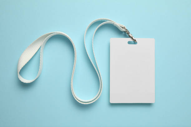 istock Name tag, badge mockup. Lanyard card blank on blue background 1151750590