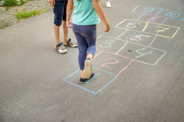 istock street children's games in classics. Selective focus. 1151751975