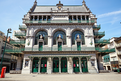 Brussels, Belgium - May 24, 2019: Former warehouse housed the Royal Flemish Theatre at the centre of Brussels, by the old quays. Historical building in neo-renaissance style.