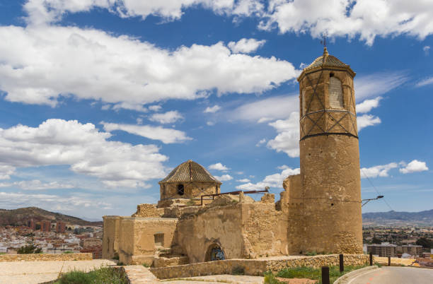 Historic San Juan church on top of the hill in Lorca Lorca, Spain - May 09, 2019: Historic San Juan church on top of the hill in Lorca, Spain lorca stock pictures, royalty-free photos & images