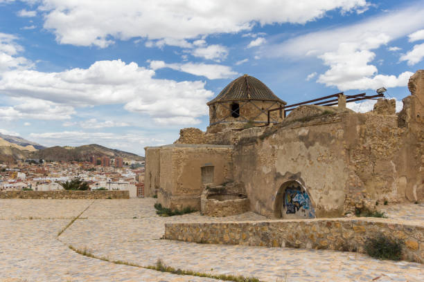 Historic San Juan church on top of the hill in Lorca Lorca, Spain - May 09, 2019: Historic San Juan church on top of the hill in Lorca, Spain lorca stock pictures, royalty-free photos & images