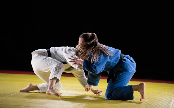 istock Female Judo Players Competing During Match 1151765853