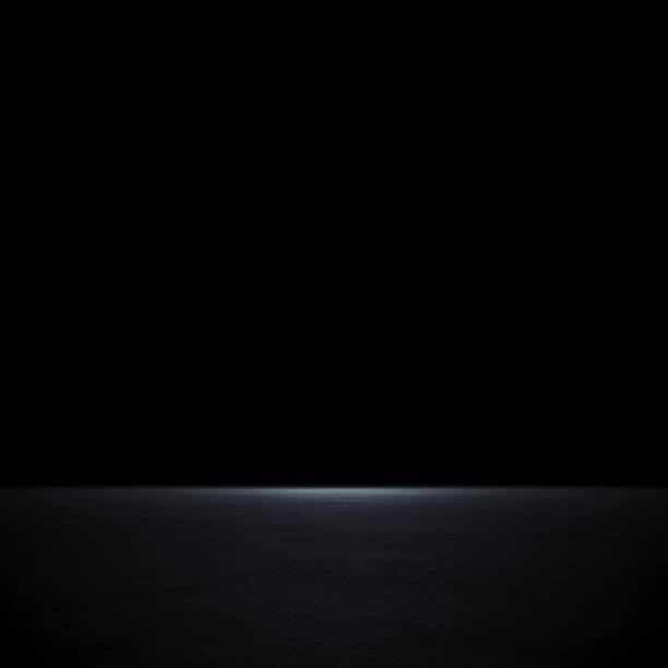 empty spot lit dark background - brightly lit imagens e fotografias de stock