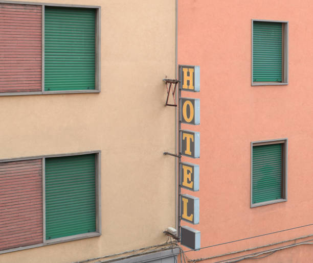 istock hotel sign and building facade 1151768596