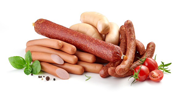 heap of various sausages isolated on white background