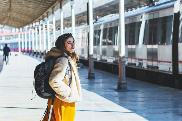 istock Young Woman Waiting For Someone On Train Station 1151769786