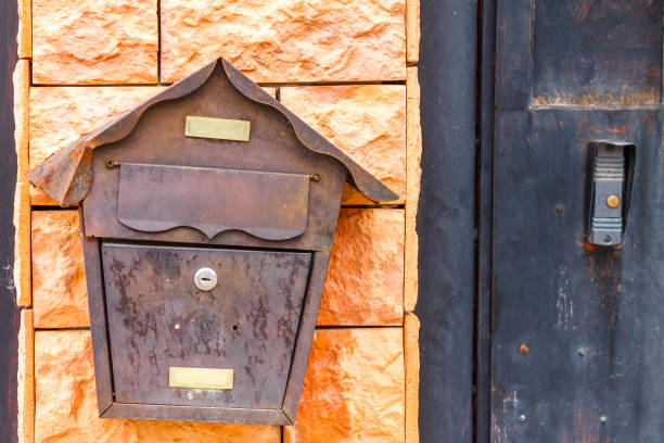istock A beautiful mailbox hangs waiting for newspapers, parcels and letters. 1151771875