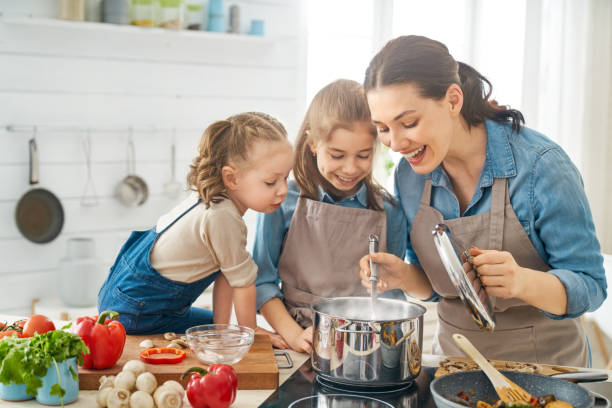 istock Happy family in the kitchen. 1151772819