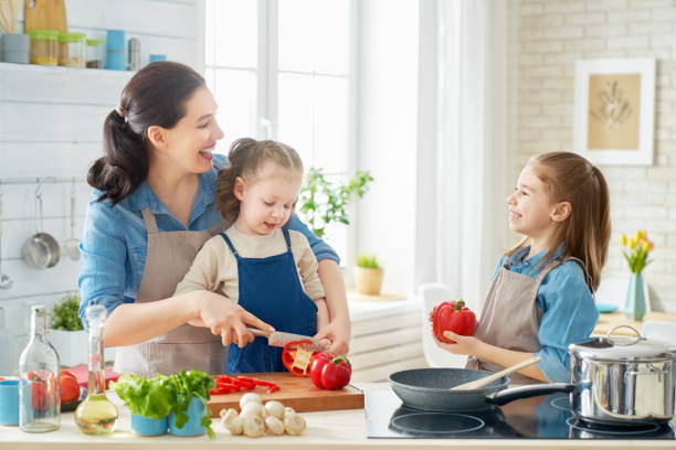 istock Happy family in the kitchen. 1151772824
