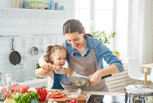 istock Happy family in the kitchen. 1151772853