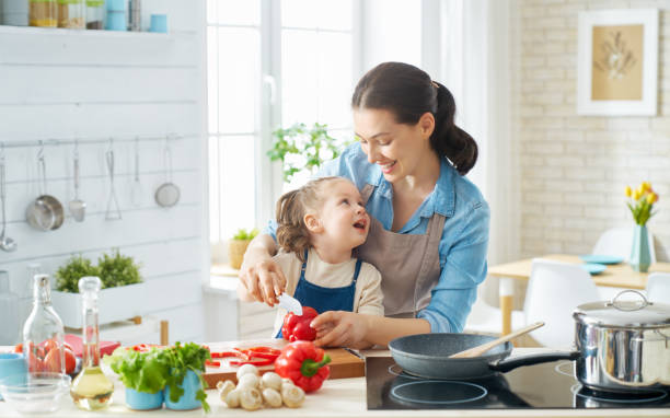 istock Happy family in the kitchen. 1151772863