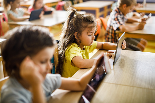 Elearning Elementary Elearning At Elementary School Stock Photo - Download Image Now - Back ...