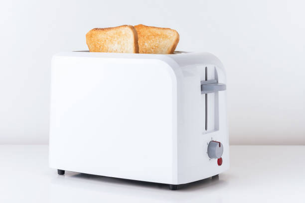 istock Toaster with  roasted toast bread on white background, close up 1151775839