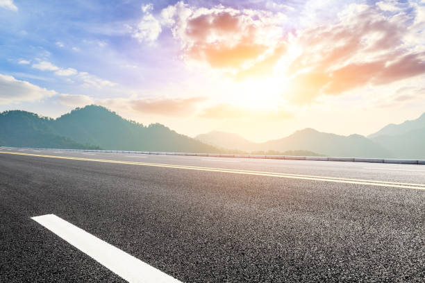 istock Highway road and beautiful mountain with clouds landscape 1151776186