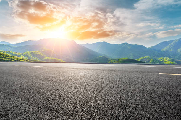 istock Highway road and beautiful mountain with clouds landscape 1151777749