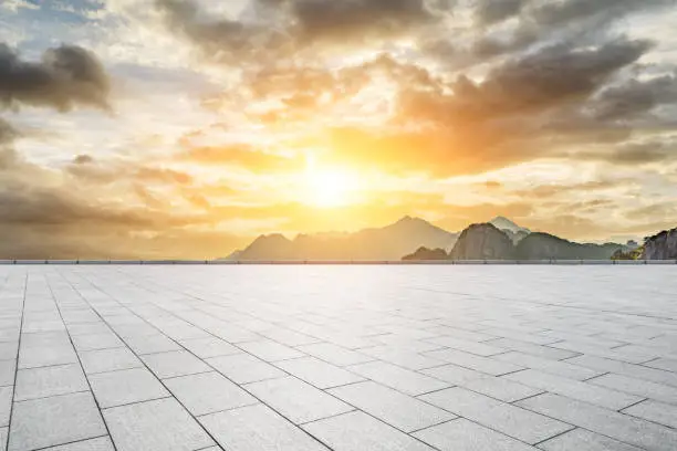 Empty square floor and beautiful mountains nature landscape at sunrise