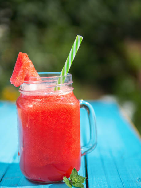 istock Watermelon lemonade in a glass mug 1151781568