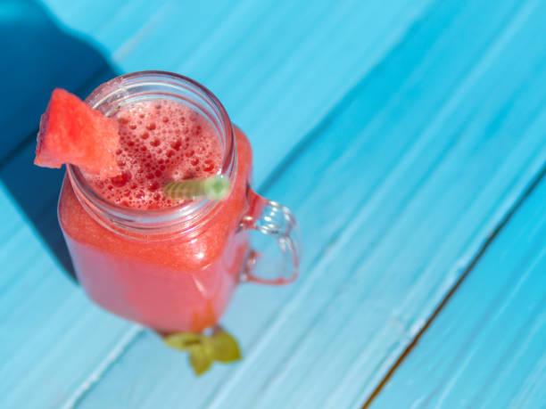 istock Watermelon lemonade in a glass mug 1151781572