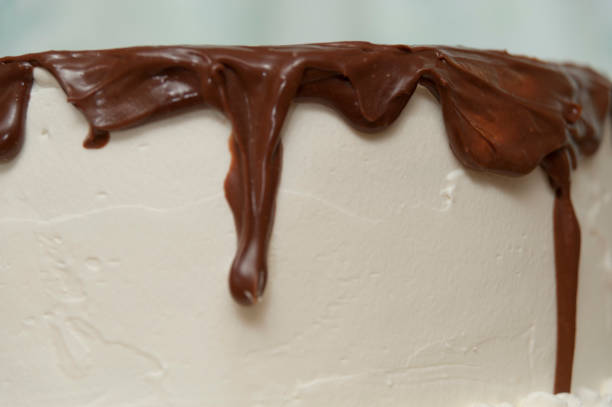 istock Birthday cake with chocolate syrup. Close-up. 1151781863