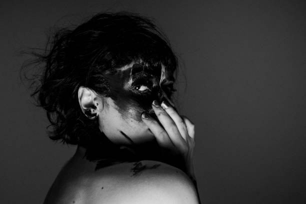 istock Model's face and body covered with paint 1151789222