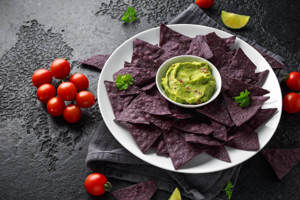 istock Blue corn Organic tortilla chips with Guacamole 1151789376