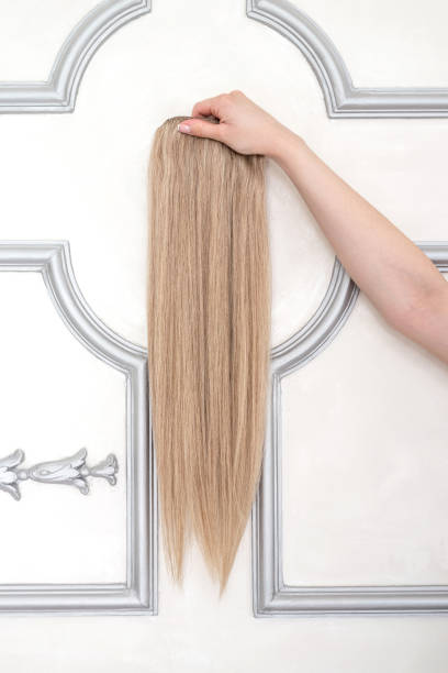 istock Sample of blond hair extension 1151791973