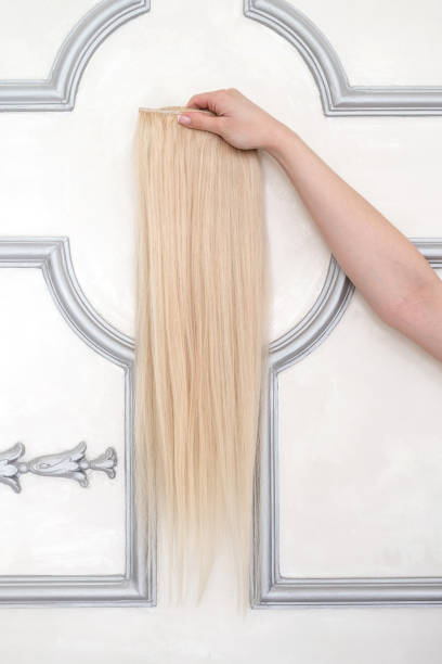istock Sample of blond hair extension 1151792046