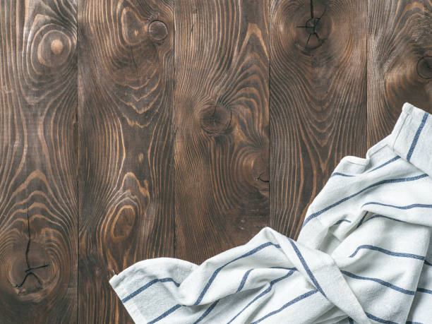 istock linen napkin on wooden table, top view, mock up 1151794615