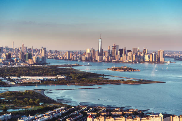 istock flying over new york with manhattan in the background 1151794617