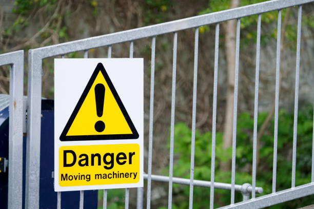 istock Moving machinery danger yellow sign 1151794630