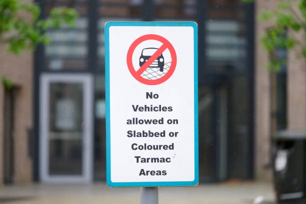 istock No vehicles allowed on slabbed or coloured tarmac area sign 1151794758