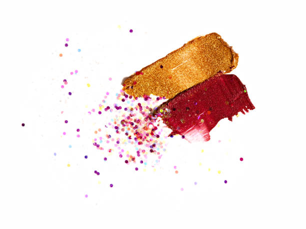 istock Red wine and gold lipstick brushstrokes with sequins. 1151798329