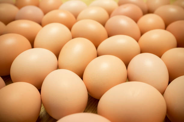 istock A pile of eggs on wood background 1151798443