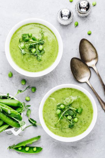 istock Summer cream soup with green fresh pea shoots 1151798470