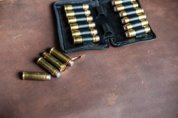 istock .44 magnum jacket soft point bullet on leather texture 1151798603